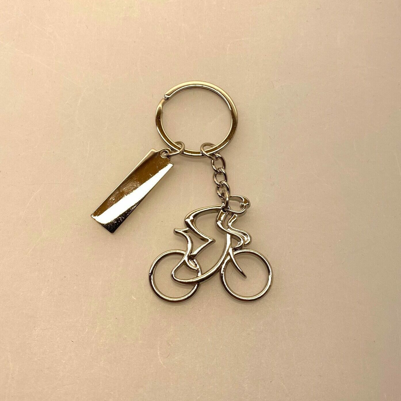 Nøglering - Cykelrytter blank med skilt