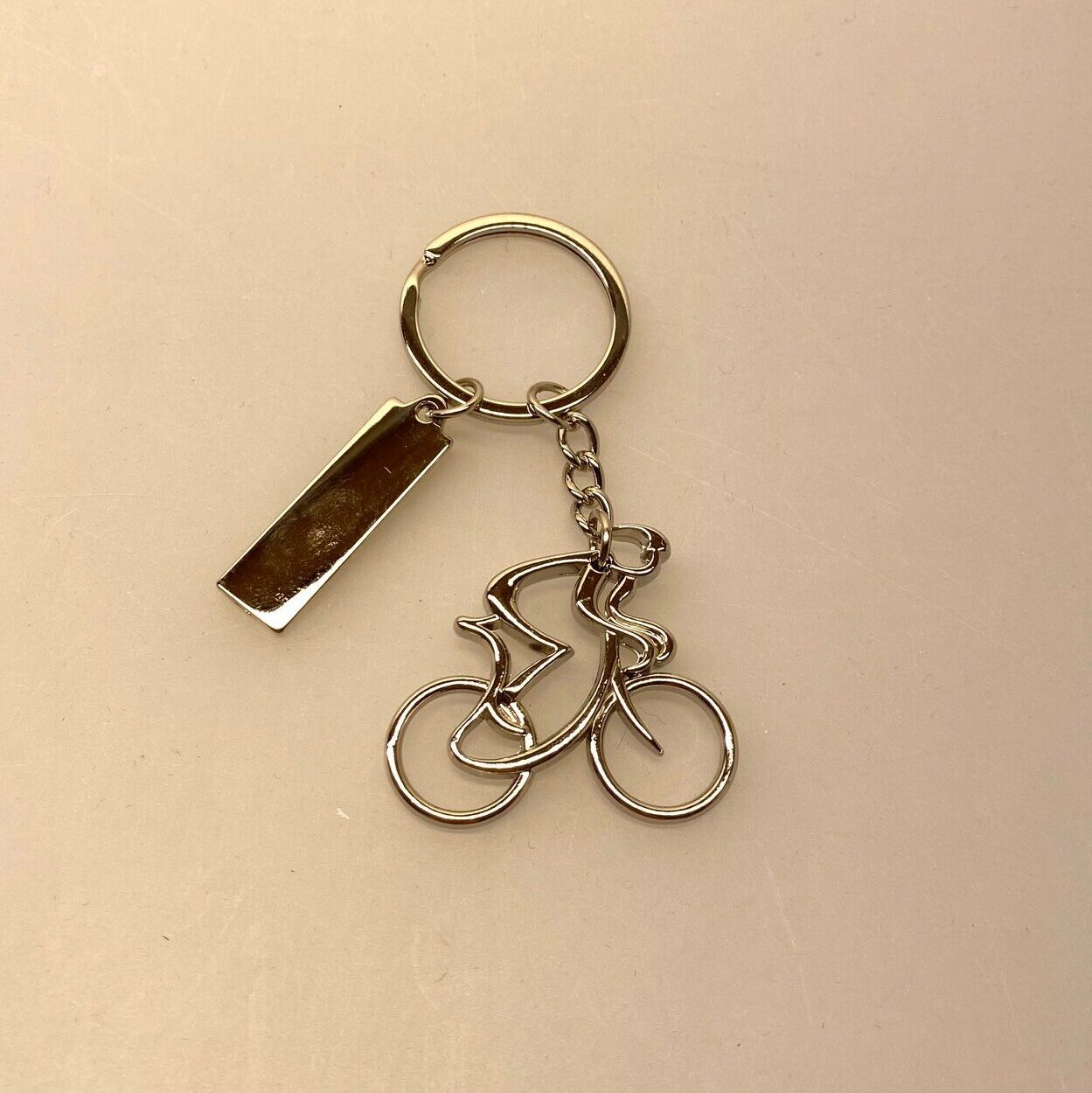 Nøglering - Cykelrytter blank med skilt