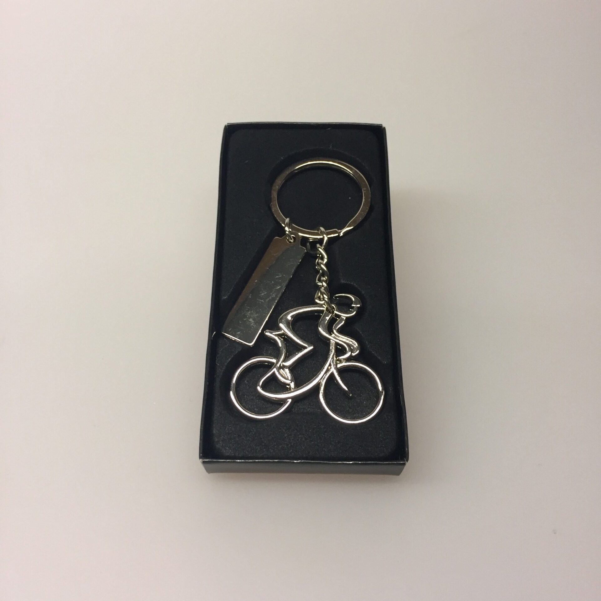 Nøglering - Cykelrytter blank med skilt