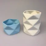 Trine Rytter keramik - Foldemønster elfenben lyseblå - Trine Rytter keramik - Foldemønster Elfenben, keramik, porcelæn, dansk, design, kunsthåndværkerne, keramikkamp, brugskunst, håndlavet, vase, fyrfadsstage, lys, kvalitet, specielt, biti, ribe