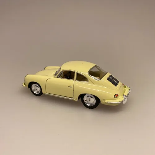 Modelbil Porsche Carrera - creme, Carrera, italiensk, flødefarvet, cremefarvet, modelbil, racerbil, luksusbil, gaveide, kørekort, ny bil, symbolsk, metalbil, flot, elegant, legetøjsbil, biti, ribe,