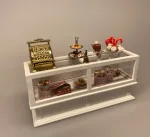 kage,Miniature Sølvopsats med kager,Miniature Bord Klokke, klokke, messing, guld, dirigentklokke, hotel, miniature, dukkehus, dukkehusting, dukkehustilbehør, dukketing, sætterkasse, sættekasse, skala, 1:12, biti, ribe