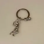 Nøglering Tennisspiller med bold, tennis, tennisspil, tennisspiller, tennisnøglering, ting med, tennisbold, gave, gaveide, tennistræner, tennisklub, tennisketcher, tennisbane, court, tennisudstyr, symbolsk, personlig, sangskjuler, tennissport, dtu, wosniaki, winbeldon, williams, biti, ribe, design, flot, kvalitet, gavekort, konfirmand, konfirmation,