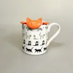Tesi - Te si til krus - Kat Orange Rød, orange, appelsin, coral, tea, tetis, tea time, afternoon tea, eftermiddagste, kat, katte, ting med, katteting, kattesi, sjov, humor, løsvægt, urtete, yndlingste, katteting, kattetesi, koziol, miaou, tee, sieb, tedrikker, morgente, løs te, urtete, grøn te, sød, sjov, gaveide, smart, biti, ribe, aften te, afteroon, tea, eftermiddags, tea, lover, personlig, krus, kop,
