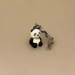 Nøglering med Panda og Bambus, bambusblade, bambusgren, pandabjørn, sort, hvid, kær, nuttet, gave, til børn, kina, østen, zoo, zoologisk have, dyrepasser, dyr, vilde, stor, bamse, lækker, kvalitet, nøglering, nyttig, flot, biti, ribe