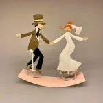 Brudepar på Cykler Metal, cykel, cyklende, cykler, unicycle, ethjulet, balance, balancekunst, bryllup, bryllupsgave, sangskjuler, brudevals, kærlighed, sjov, kagefigur, bryllupskage, kransekagefigur, topfigur, dansende, særlig, personlig, sjov, gave, forlovelse, biti, ribe, baden, team work, tillid,
