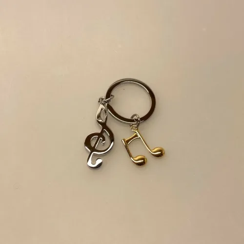 Nøglering G-nøgle & Gylden Node, musik, musiker, music, lover, musikelsker, dj, instrument, opera, spotify, symbolsk, gave, koncert, billetter, gavekort, invitation, jam, konservatoriet, student, lille, gave, gaveide, biti, ribe, flot, fin, kvalitet, taskevedhæng,