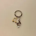 Nøglering G-nøgle & Gylden Node, musik, musiker, music, lover, musikelsker, dj, instrument, opera, spotify, symbolsk, gave, koncert, billetter, gavekort, invitation, jam, konservatoriet, student, lille, gave, gaveide, biti, ribe, flot, fin, kvalitet, taskevedhæng,