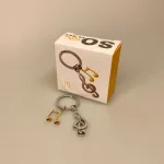 Nøglering G-nøgle & Gylden Node, musik, musiker, music, lover, musikelsker, dj, instrument, opera, spotify, symbolsk, gave, koncert, billetter, gavekort, invitation, jam, konservatoriet, student, lille, gave, gaveide, biti, ribe, flot, fin, kvalitet, taskevedhæng,