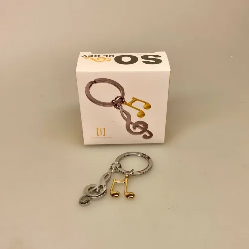 Nøglering G-nøgle & Gylden Node, musik, musiker, music, lover, musikelsker, dj, instrument, opera, spotify, symbolsk, gave, koncert, billetter, gavekort, invitation, jam, konservatoriet, student, lille, gave, gaveide, biti, ribe, flot, fin, kvalitet, taskevedhæng,