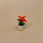 Miniature Potte med Rød Julestjerne, juleblomst, december, urtepotte, julepynt, 1:12, miniature, nisser, nissen, nissebo, sættekasse, sætterkasse, pynt, mini, sjov, nissedør, jul i, dukkehuset, dukkehustilbehør, dukkehusting, ting, til, tilbehør, sangskjuler, rød, julerød, symbolsk, gave, gavkort, biti, ribe