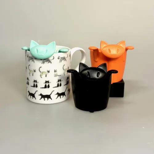 Tesi - Te si til krus - Kat Orange Rød, Tesi - Te si til krus - Kat Orange Rød, Tesi - Te si til Krus - Kat Sort, Tesi - Te si til Krus - Kat Grøn, sweet, green, mint, turkis, lysegrøn, katteting, kattetesi, koziol, miaou, tee, sieb, tedrikker, morgente, løs te, urtete, grøn te, sød, sjov, gaveide, smart, biti, ribe, aften te, afteroon, tea, eftermiddags, tea, lover, personlig, krus, kop,