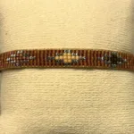 Vævet Armbånd Sead Beads 8 mm - Dust Sølv, Vævet Armbånd Sead Beads Bredt - Dust Sølv, brunt, unika, særlig, kærlighed, brud, morgengave, bryllup, gave, valentines, kæreste, forlovelse, feminint, sui ava, enamel, leju, vævet, håndvævet, fransk, holland, moderne, kunst, kunsthåndværk, one of a kind, kvalitet, holdbart, venskab, amulet, lykkebringende, smykke, flot, cool, lækkert, anni lu, biti, ribeds Bredt - Sort Sølv , japanske, sea beeds, miyuki, perler, glas, skinner, blanke, indiansk, håndlavet, maskulint, feminint, sort, perlearmbånd,