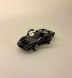 Modelbil Ford GT 40 - Sort, black rider, butterfly, døre, gti, old timer, old school, cool, hurtig, racer, racerbil, sportsvogn, benzin, fast car, modelbil, samler, mekaniker, kørekort, 18 år, symbolsk gave, gaveide, tillykke, drengerøv, drengebil, kontor, ungdom, biti, ribe, legendarisk, flot, sej, racerkører, le mans, formel 1,
