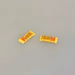 Miniature KEX i Pakke, 7452, kiks, mellemmåltid, snack, slik, 1:12, miniature, sjov, dukkehus, ting, tilbehør, nisse, nissedør, nissemad, nissetilbehør, sættekasse, sætterkasse, sangskjuler, personlig, symbolsk, dukkehusting, dukkehustilbehør, mini, flot, fint, biti, ribe,