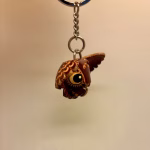 Nøglering af Kernelæder - Ugle, læder, kernelæder, nøglering, uglenøglering, ugleting, ugler, den kloge, eksamen, eksamensgave, symbolsk, student, LSA-14, håndlavet, lædernøglering, biti, ribe, amulet, lykkebringende, taskevedhæng, charm, rejse, viden, klogskab, intellekt