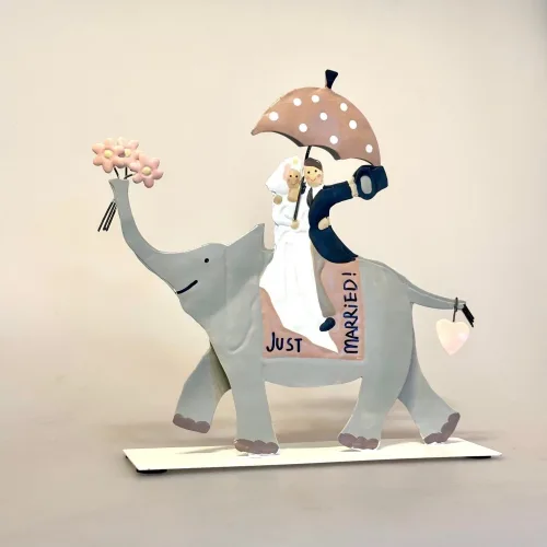 Brudepar på Elefant Metal, baden, elefant, ridning, eksotisk, bryllup, brudepar, brud, gom, bryllupsgave, sangskjuler, symbolsk, gave, gaveide, gavekort, guldbryllup, sølvbryllup, rejse, rejsegavekort, afrika safari, østen, indien, bryllupsrejse, lykke, når enden er god, lykkebringende, biti, ribe, sjov, tale, personlig, humor, humoristisk,