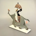 Brudepar på Elefant Metal, baden, elefant, ridning, eksotisk, bryllup, brudepar, brud, gom, bryllupsgave, sangskjuler, symbolsk, gave, gaveide, gavekort, guldbryllup, sølvbryllup, rejse, rejsegavekort, afrika safari, østen, indien, bryllupsrejse, lykke, når enden er god, lykkebringende, biti, ribe, sjov, tale, personlig, humor, humoristisk,