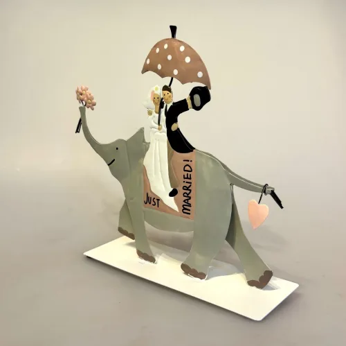 Brudepar på Elefant Metal, baden, elefant, ridning, eksotisk, bryllup, brudepar, brud, gom, bryllupsgave, sangskjuler, symbolsk, gave, gaveide, gavekort, guldbryllup, sølvbryllup, rejse, rejsegavekort, afrika safari, østen, indien, bryllupsrejse, lykke, når enden er god, lykkebringende, biti, ribe, sjov, tale, personlig, humor, humoristisk,