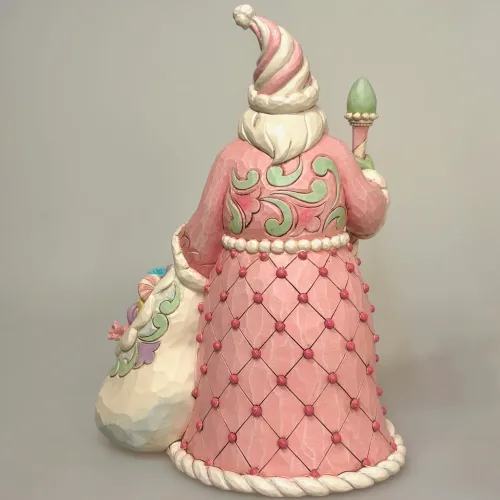 Jim Shore Heartwood Creek 24 cm Julemand - Sweet.sweet treat santa, 6017018, pastelfarvet, cotton candy, slik, sukker, den store bagedyst, meterværk, konditor, pasteljul, lyserød, rosa, yndig, lækker, herlig, sjov, særlig, unik, one of a kind, samler, julemand, figur, jim shore, heartwood creek, biti, ribe,