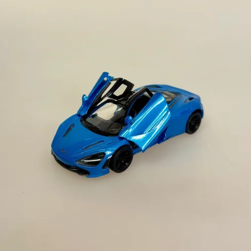 Modelbil Mclaren 720S Racer Turkis, metallic, spider, formel 1, formel one, tacer, butterfly, døre, gti, old timer, old school, cool, hurtig, racer, racerbil, sportsvogn, benzin, fast car, modelbil, samler, mekaniker, kørekort, 18 år, symbolsk gave, gaveide, tillykke, drengerøv, drengebil, kontor, ungdom, biti, ribe, legendarisk, flot, sej, racerkører, le mans,