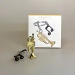 Nøglering Trompet & Node, trumpet, 401-01, messingblæser, trompetist, instrument, musikalsk, musik, elsker, musiker, konservatorie, jazz, jazzmusik, gave, symbolsk, lækker, kvalitet, pengegave, koncert, hornorkester, symfoni, orkester, nøglering, gave, musikgave, biti, ribe