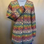 Alpaka Cardigan Lang - Catherine Jeans Multi, lang, long, firgur, timeglas, klædelig, smart, smuk, særlig, lama, uld, alpaca, alpakastrik, strik, damestrik, knapper, v-hals, v-udskæring, blomster, regnbue, rainbow, farveglad, farverig, floral, ikat, farveforløb, fintstrikket, lærke bakker, strikkedesign, design, alpakastrik, alpakatrøje, striktrøje, strikjakke, varm, blød, ren, natur, materialer, bæredygtig, holdbar, miljø, biti, ribe,